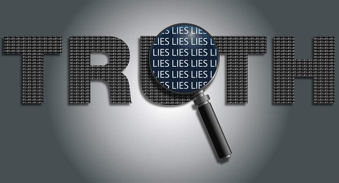 A magnifying glass over the word "TRUTH" reveals it's made up of the word "LIES"